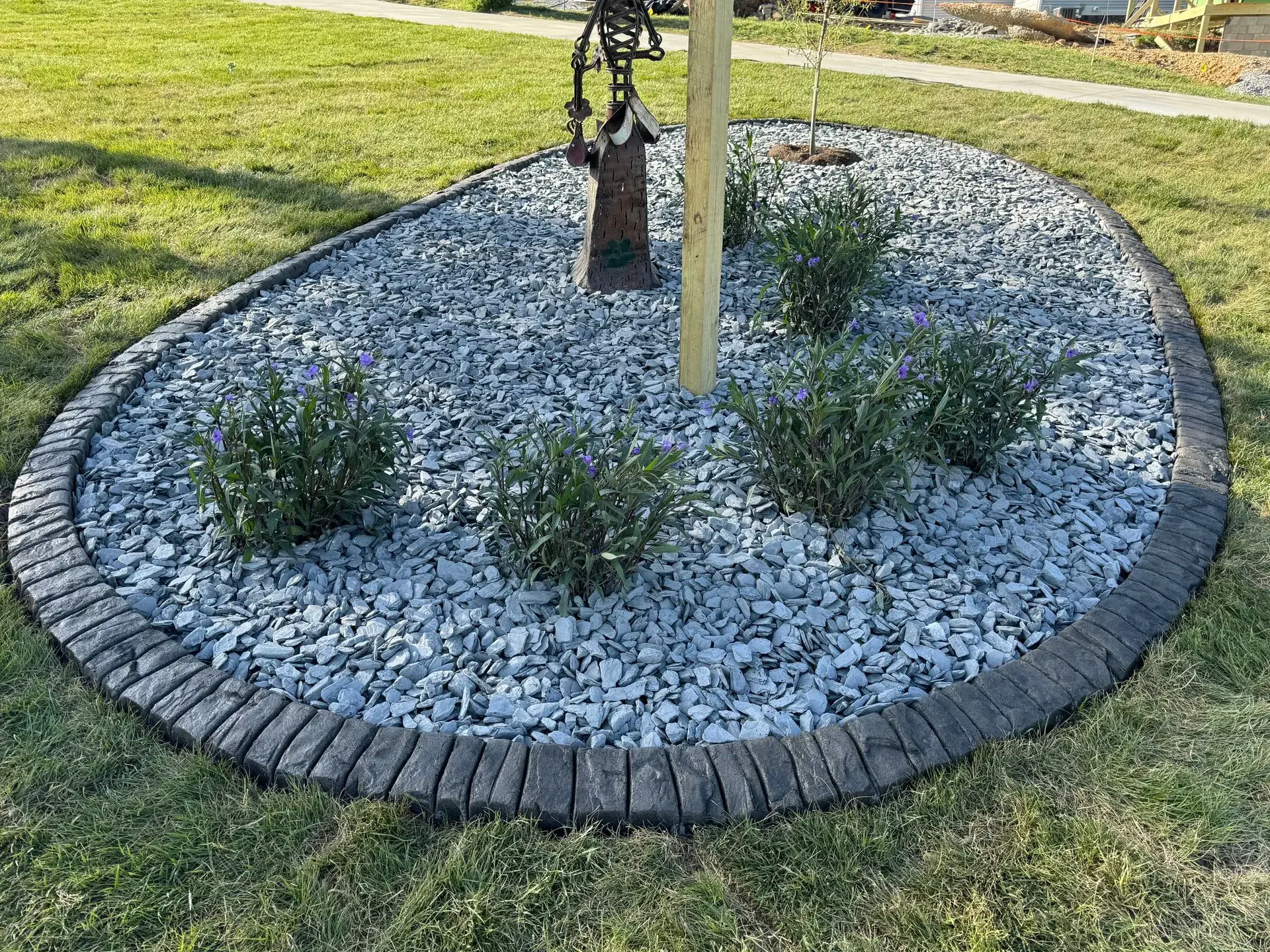 Hand Hewn Wood stamped concrete curbing pattern
