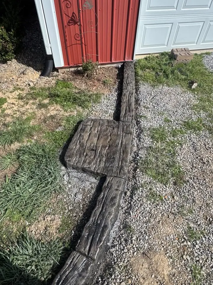 Decorative landscape edging poured by The Muscle